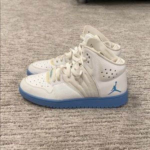 White and blue Jordans
